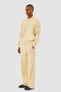 Arte Antwerp Pantalon à bandes fleuries - Crème Fashion